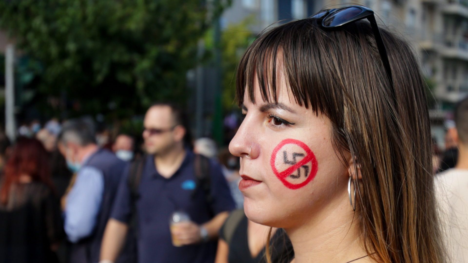 Anti-fascist 
protesters 
demonstrate 
outside the trial 
of members 
of the Golden 
Dawn party in 
2020 in Athens. Photo: Milos 
Bicanski/Getty