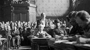 Marshal Philippe Pétain, the former French chief of state during the Nazi occupation, listens as his lawyer, Jacques Isorni, addresses the court during his trial in July 1945. Photo: AFP/Getty