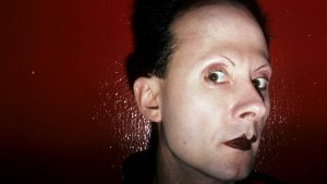 Klaus Nomi in 1982 and, below, in 1979 as he arrives with a friend for Mr Mike’s Mondo Video Party at Tango Palace in Times Square, New York. Photos: Peter Noble/Redferns; Allan Tannenbaum/Getty