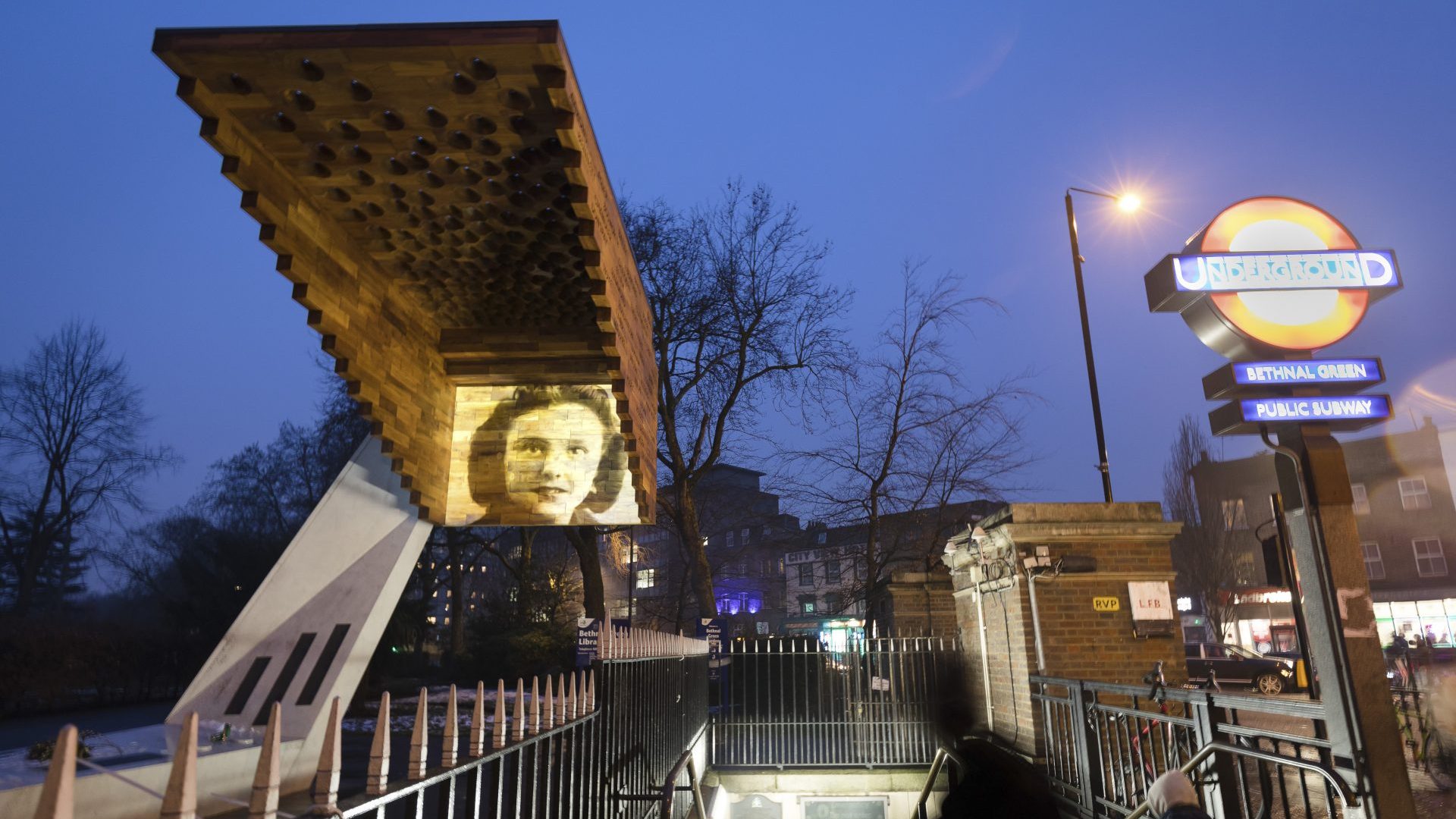 rojections of the victims of the Bethnal Green tube disaster are projected on to a memorial on the 75th anniversary of the disaster
The grandmother of Millie Bobby Brown, right, was a survivor. Photos: Vickie Flores/In Pictures; Jun Sato/WireImage/Getty