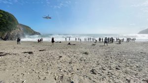The dramatic rescue of a couple who became cut off by the rising tide and huge waves following a storm at Lantic Bay, Cornwall. Photo: Rob Sullivan