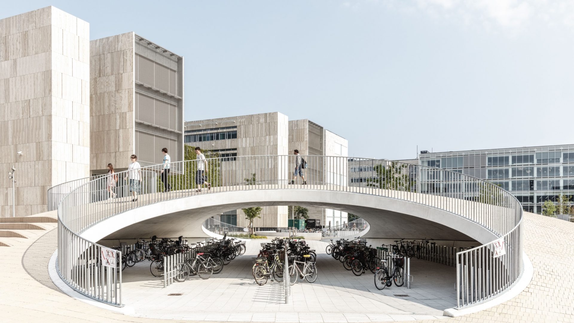 Karen Blixen Square, designed by Cobe and built in 2019, is one of the largest public squares in Copenhagen. It has a functional role, housing up to 2,000 bikes, as well as being a recreational resource. Photo: Rasmus Hjortshøj
