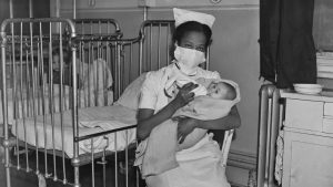A nurse from Saint Kitts feeds a baby on a children’s ward in London, March 1945. Nostalgia for the supposedly monocultural Britain of yesteryear is misguided at best. Photo: Keystone/Hulton Archive/Getty