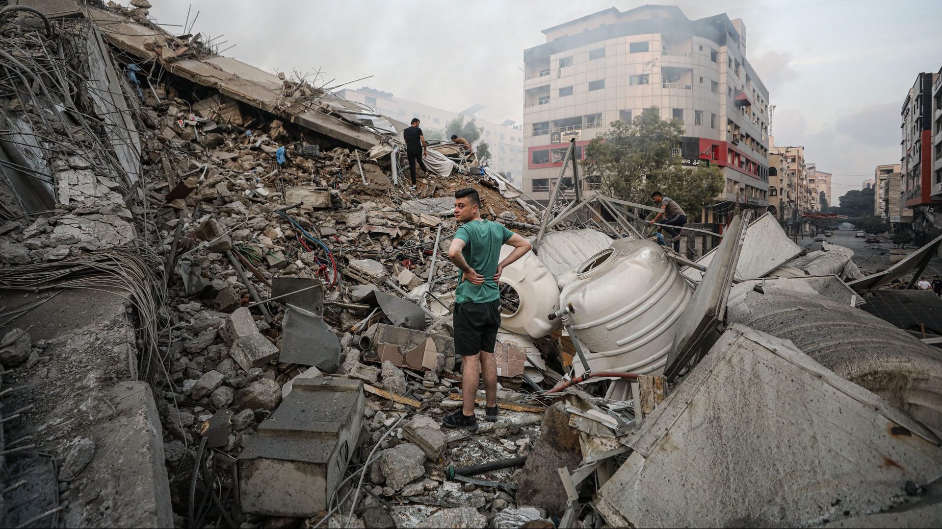 A view of debris after Israeli fighter jets destroyed the 14-storey building 'Vatan' in Gaza City (Photo by Mustafa Hassona/Anadolu Agency via Getty Images)