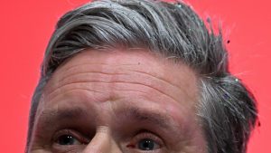 Sir Keir Starmer is adorned with glitter as he addresses delegates at the Labour Party’s annual conference in Liverpool. Photo: Oli Scarff/ AFP/Getty