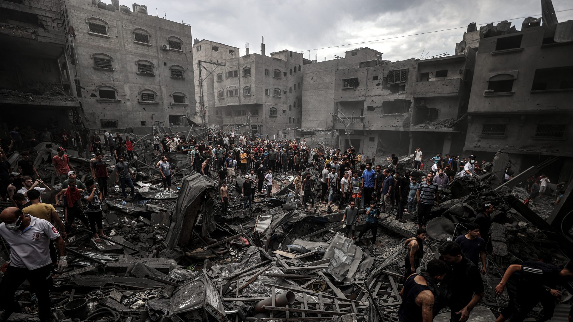 Civil defense teams and civilians conduct search and rescue operations after Israeli attacks on Al-Shati refugee camp of Gaza City. Photo: Ali Jadallah/Anadolu via Getty Images