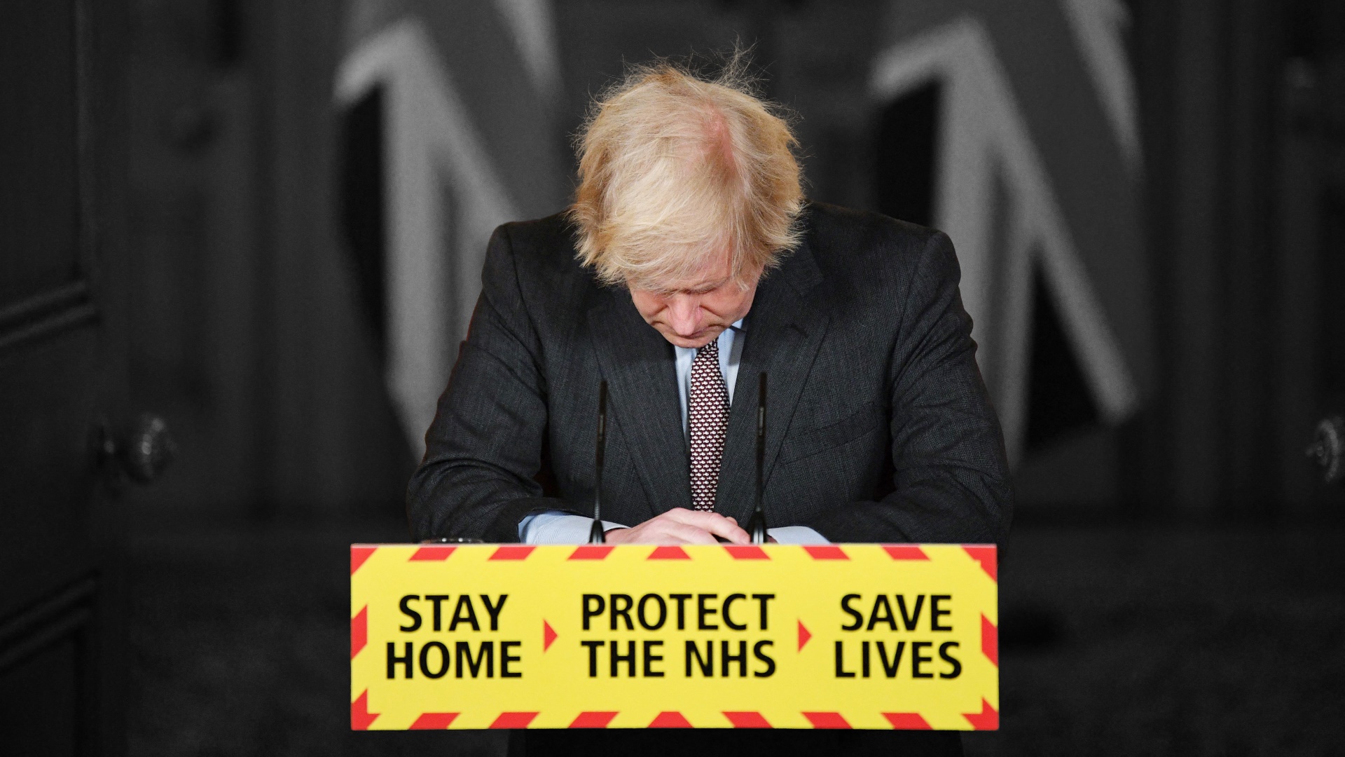 By the time Boris Johnson took this virtual press conference on January 26, 2021, more than 100,000 people in Britain had died after testing positive for coronavirus. Photo: Justin Tallis/AFP/Getty