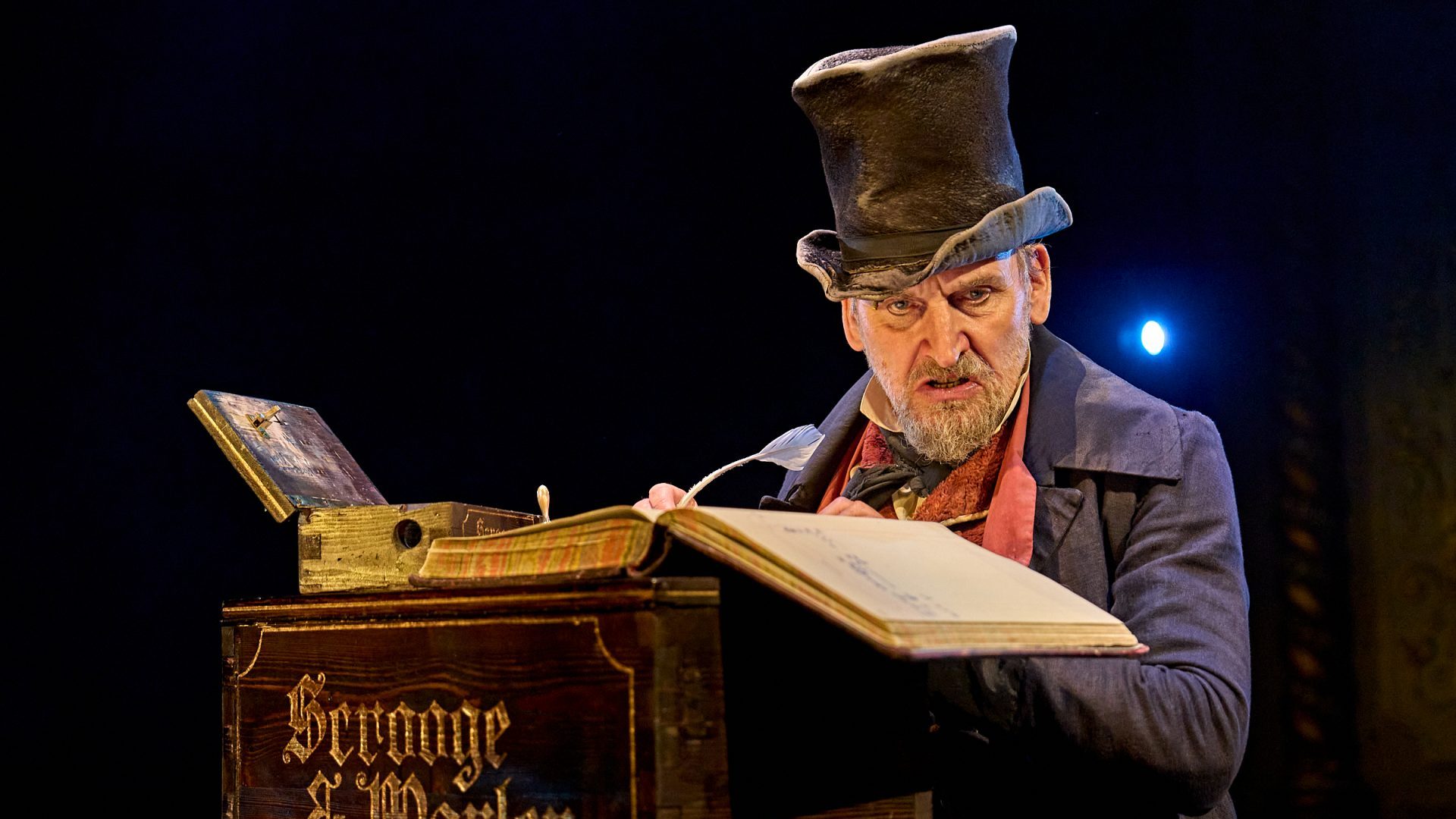 Christopher Eccleston as Ebenezer Scrooge in A Christmas Carol at The Old Vic. Photo by Manuel Harlan