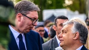 Serbian President Aleksandar Vucic (L) talks to Hungarian Prime Minister Viktor Orban during a military exercise at a ceremony marking the Serbian Armed Forces Day. Photo: ANDREJ ISAKOVIC/AFP via Getty Images