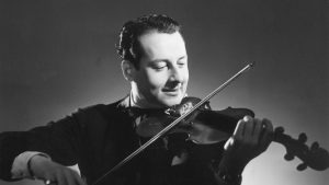 French jazz violinist Stéphane Grappelli, who founded the Quintette du Hot Club de France with guitarist Django Reinhardt in 1934. Photo: Baron/Hulton Archive/Getty