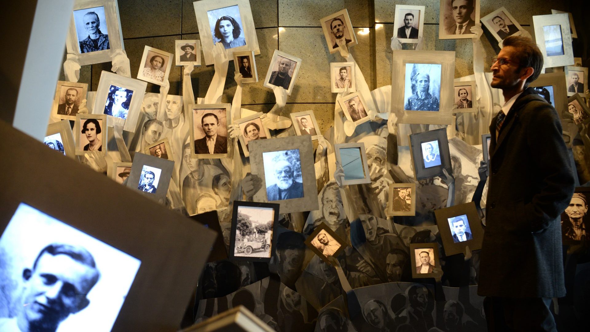 People visit an exhibition at Holocaust Museum during the Yom HaShoah - Holocaust Remembrance Day in Skopje. Photo: Nake Batev/Anadolu Agency/Getty Images