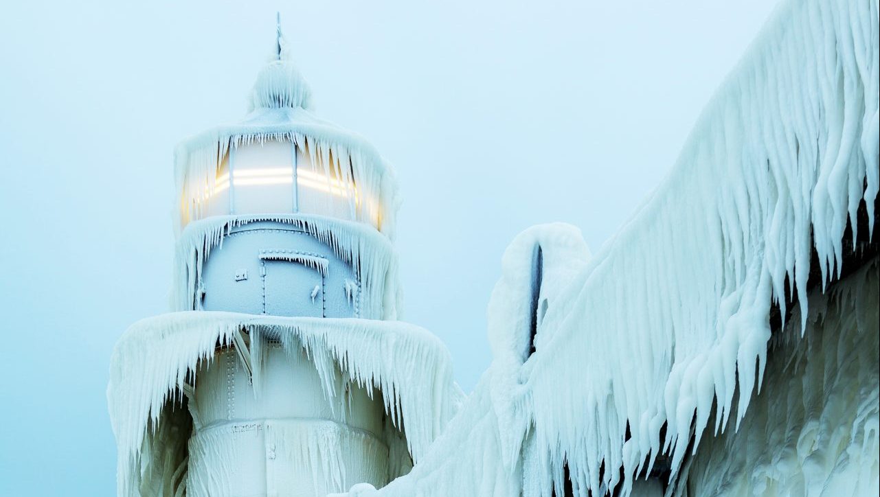 A beautifully illustrated guide to some of the world’s remotest spots is one of Charlie’s picks for Christmas, featuring places such as this frozen lighthouse in Michigan, US. Photo: Arkadiusz Ziomek/Getty