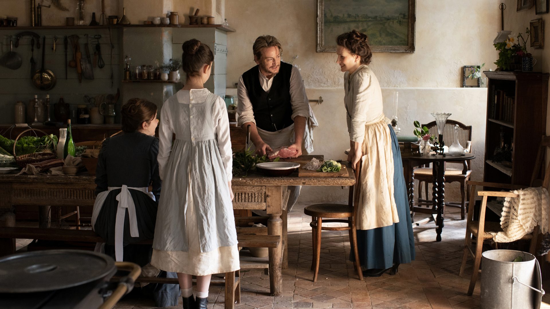 Benoît Magimel and Juliette Binoche in The Taste of Things. Courtesy of Carole Bethuel