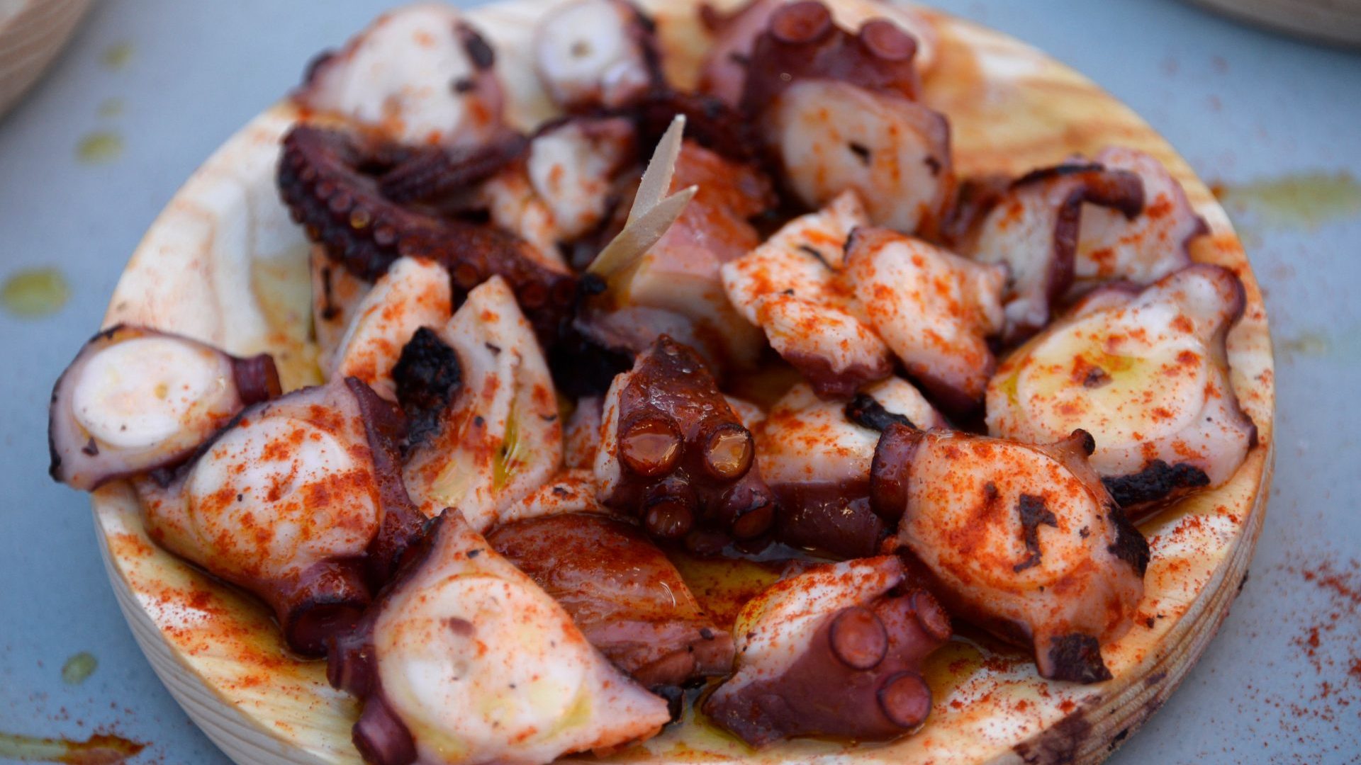 Pulpo a feira is a typical Galician dish: the octopus is boiled in copper pans, cut up into bite-sized pieces and seasoned with olive oil and paprika. Photo: Miguel Riopa/AFP/Getty