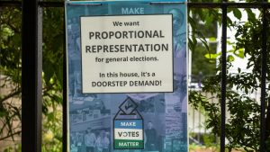 A poster attached to railings in Hampshire calling for proportional representation in British elections. Photo: Andy Soloman/UCG/Universal Images Group/Getty