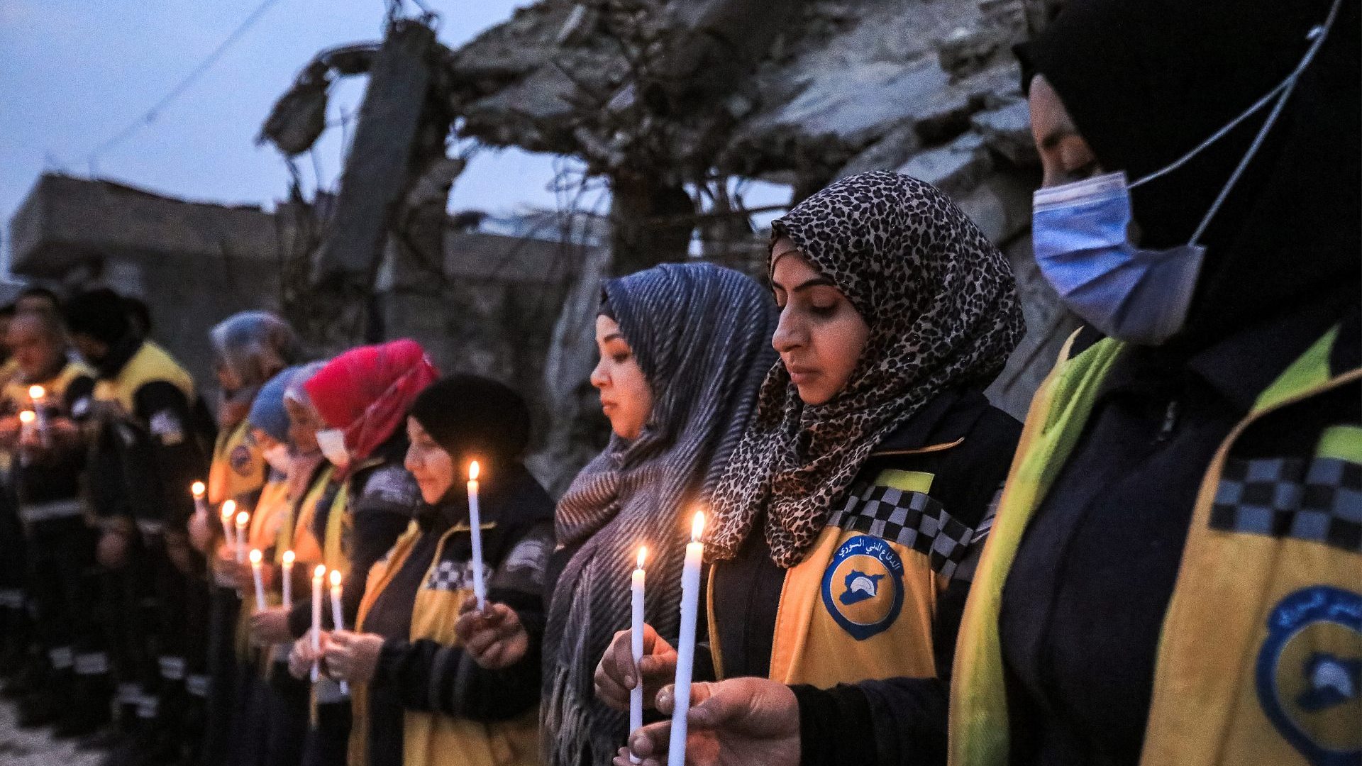 Survivors of the 2023 earthquake that devastated northern Syria and Turkey hold a vigil to mark the first anniversary in Syria’s Aleppo province. Photo: Bakr Alkasem/AFP/Getty