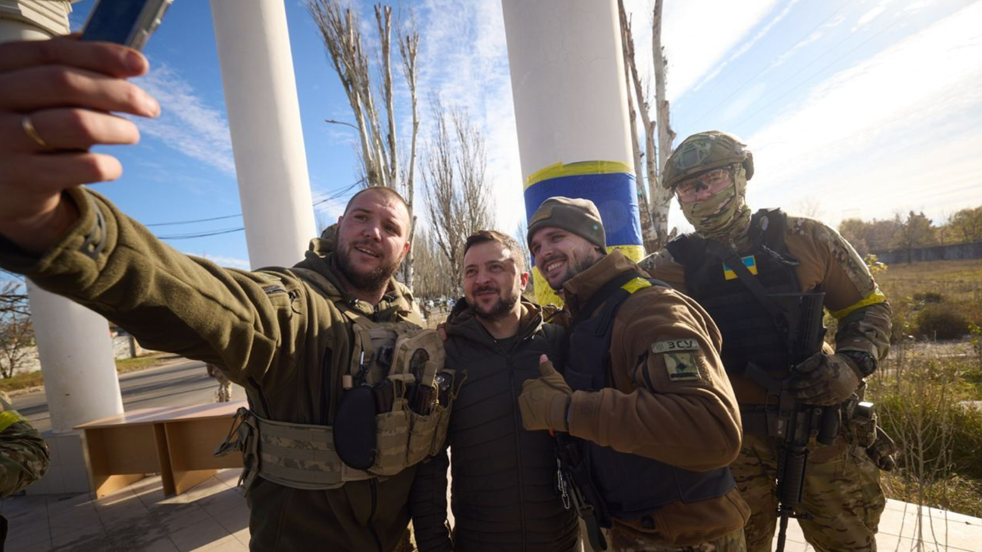 Ukrainian soldiers in Kherson take a selfie with their president, Volodymyr Zelensky. Photo: Ukrainian Presidency/Anadolu Agency/Getty