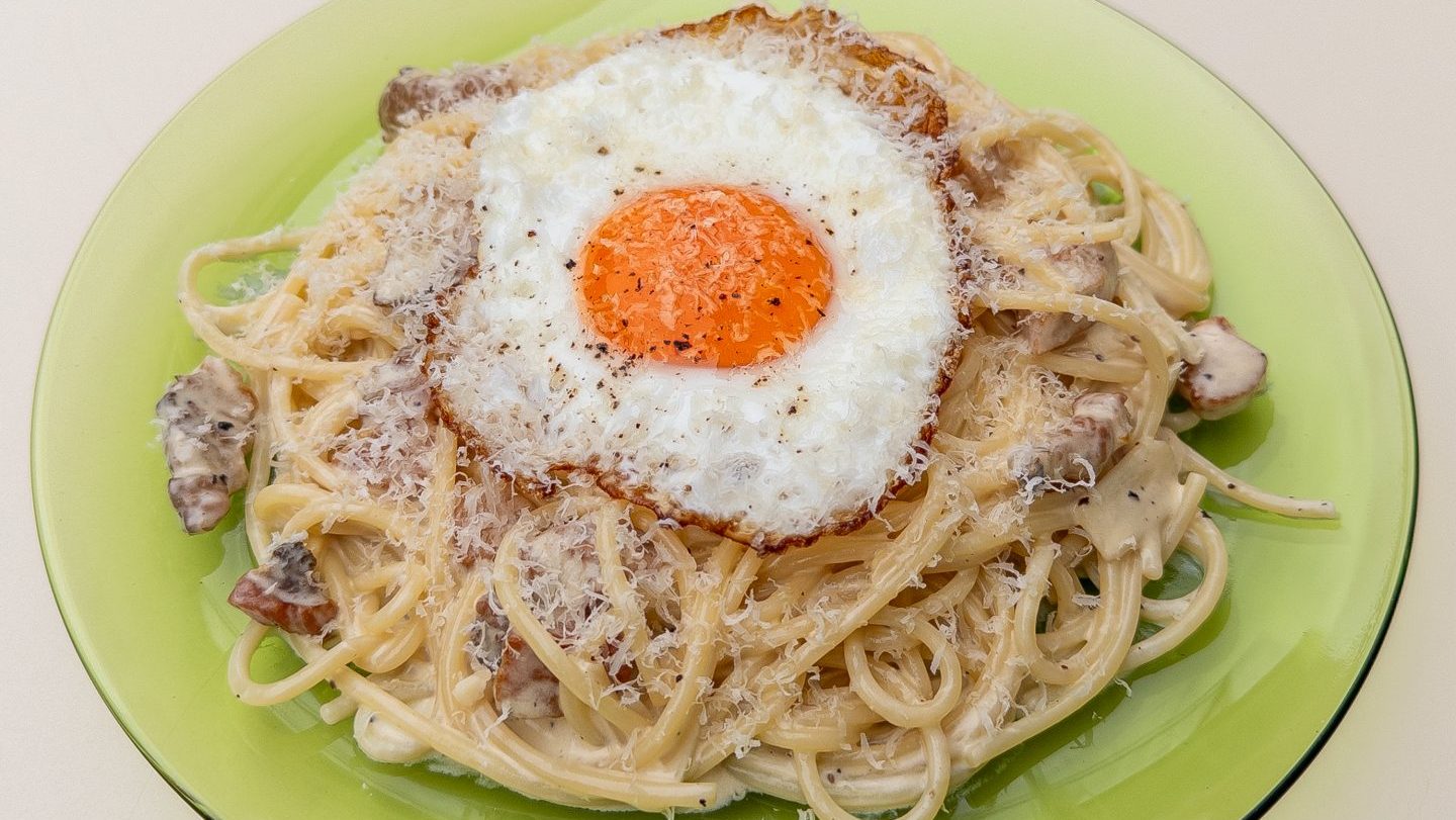 Café Britaly’s carbonara, complete with cream and greasy spoon-style fried egg Photo: Café Britaly