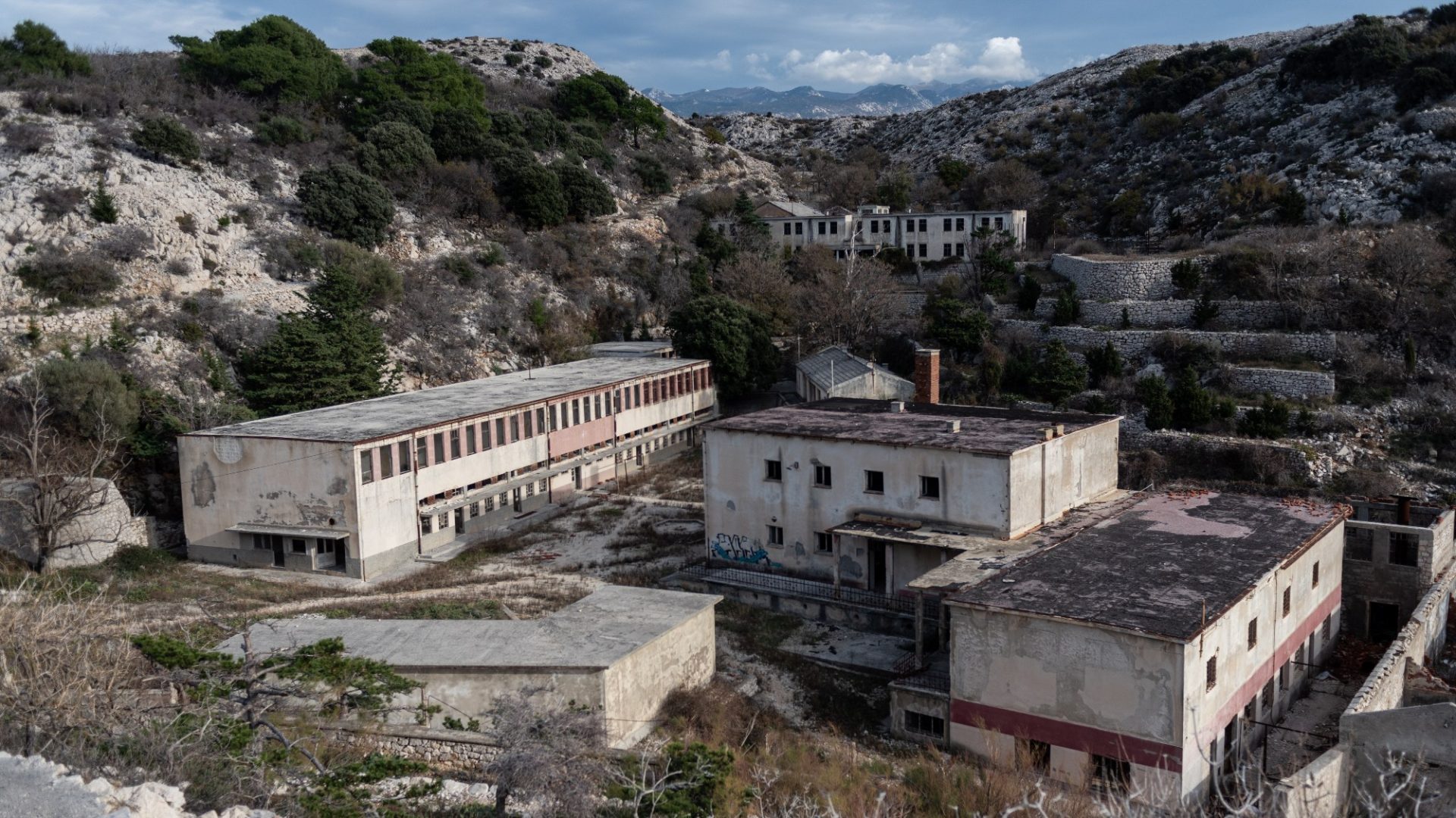 The central street of Goli Otok, which housed the many workshops – from wood to marble to iron – in which the prisoners worked. It was here that the inmates wore themselves out the most. All photos on this page: Federico Tisa