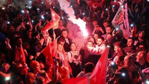 Opposition Republican People's Party (CHP) supporters celebrate outside the main municipality building. Photo: YASIN AKGUL/AFP via Getty Images