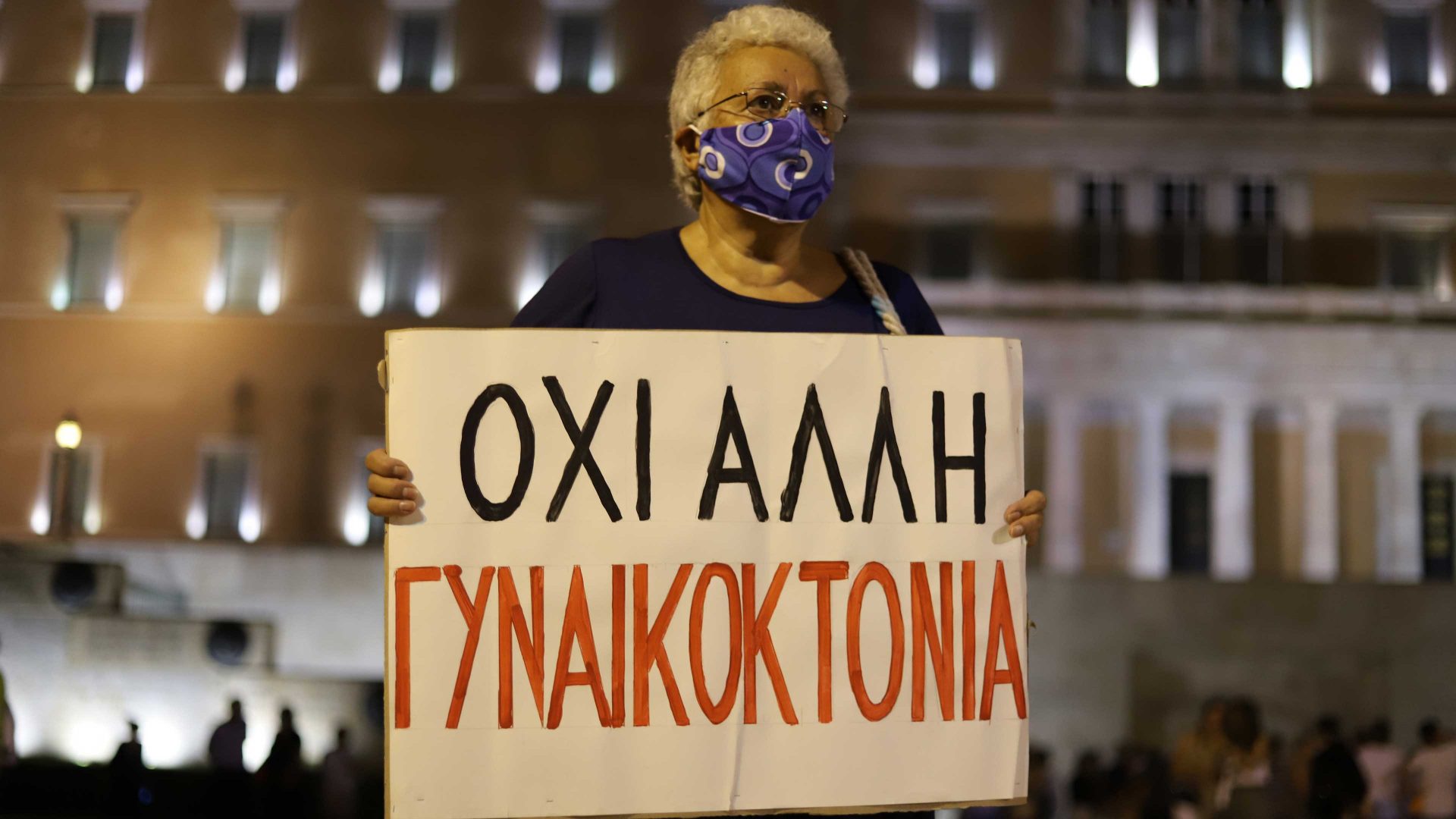Women rights activist holding placard protest against feminicide. Photo: George Panagakis/Pacific Press/LightRocket via Getty Images