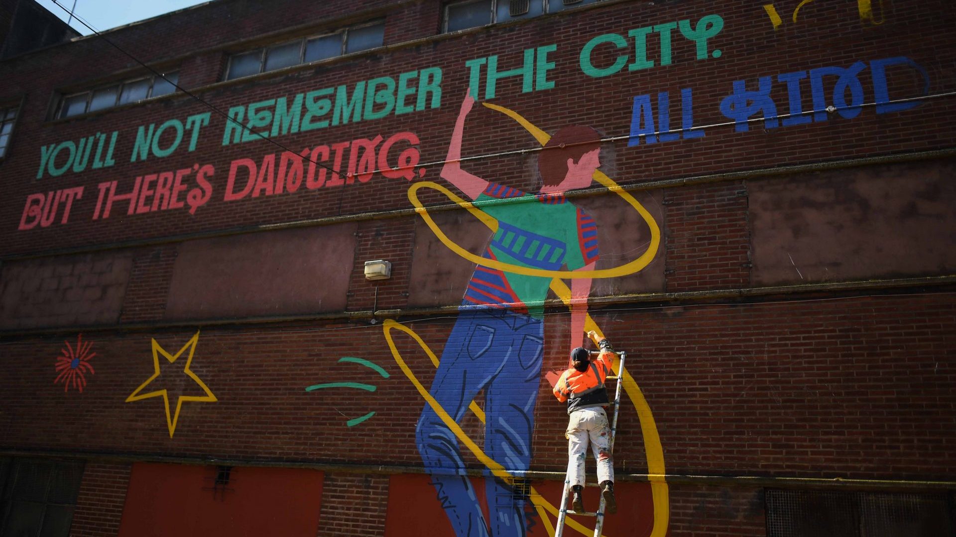 An artist works on a Shuggie Bain mural for the 2021 Aye Write literary festival in Glasgow. This year’s festival has been cancelled after the funding application to Creative Scotland was turned down. Photo: Peter Summers/Getty