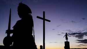 Euflasia de Jesus, an indigenous artisan from the Massacara village of the Kaimbe people, is pictured close to the Canudos Wind Energy Complex in Bahia state, Brazil. Photo: Rafael Martins/AFP/Getty