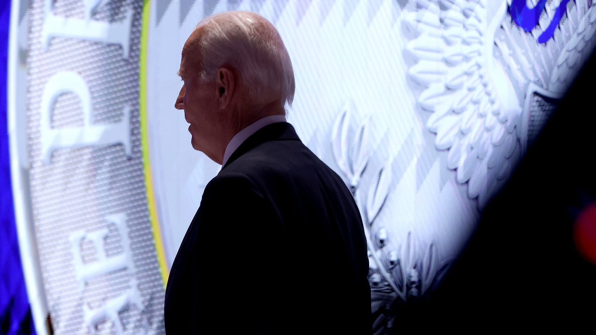 Joe Biden walks off stage during the CNN Presidential Debate (Photo by Justin Sullivan/Getty Images)
