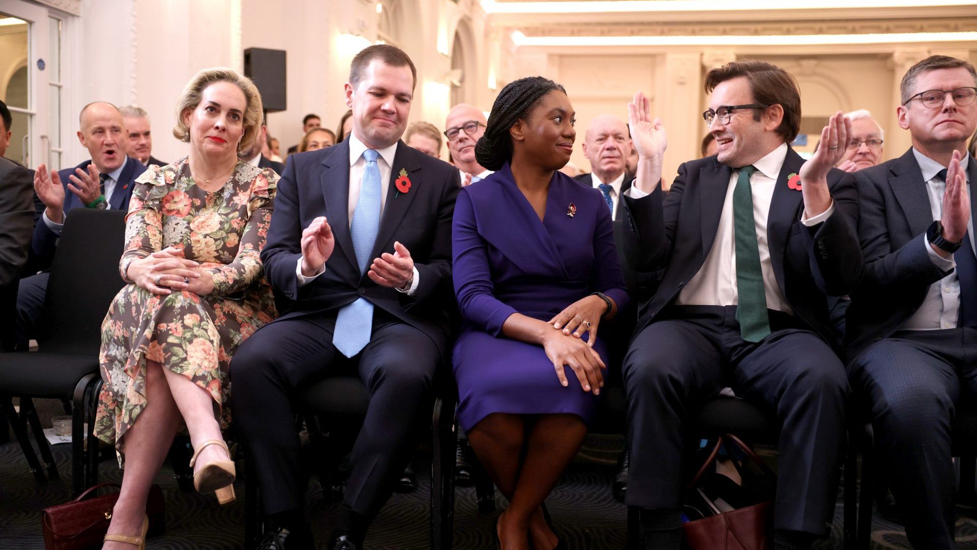 Kemi Badenoch is congratulated by her husband Hamish, Robert Jenrick and wife Michal Berkner after winning the Conservative Party leadership contest. Photo: Dan Kitwood/Getty Images