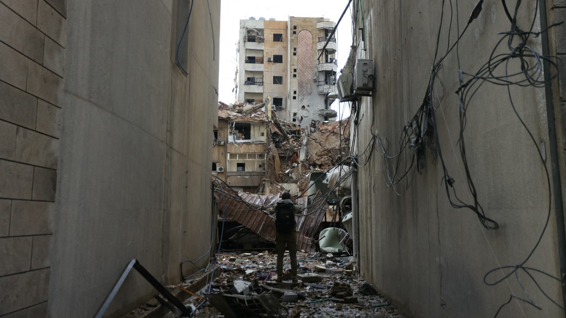A man inspects the damage at the site of an overnight Israeli airstrike that targeted the Shiyah neighborhood in Beirut. Photo: IBRAHIM AMRO/AFP via Getty Images
