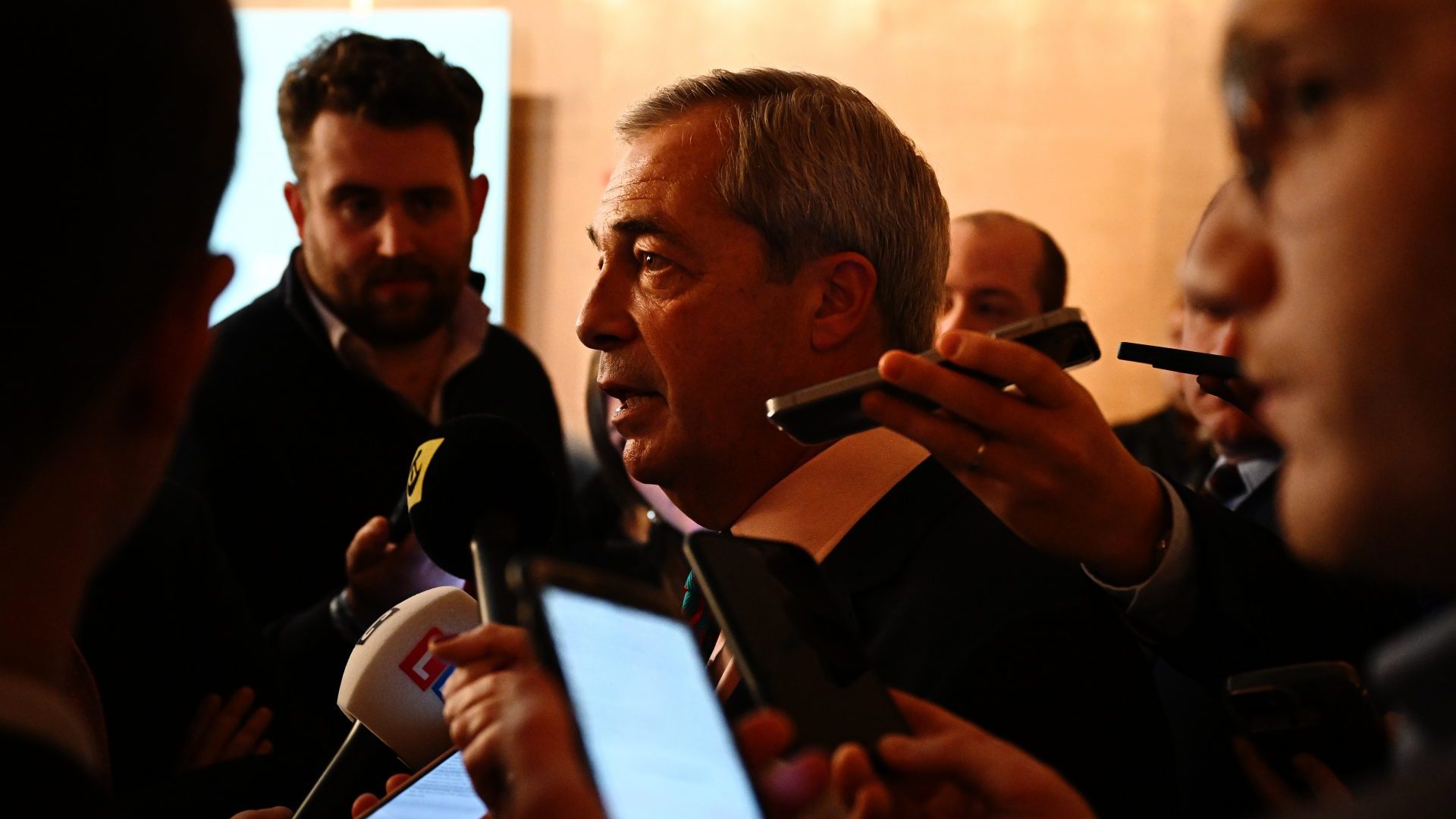 Nigel Farage talks while attending a Reform UK press conference. Photo: Leon Neal/Getty Images)