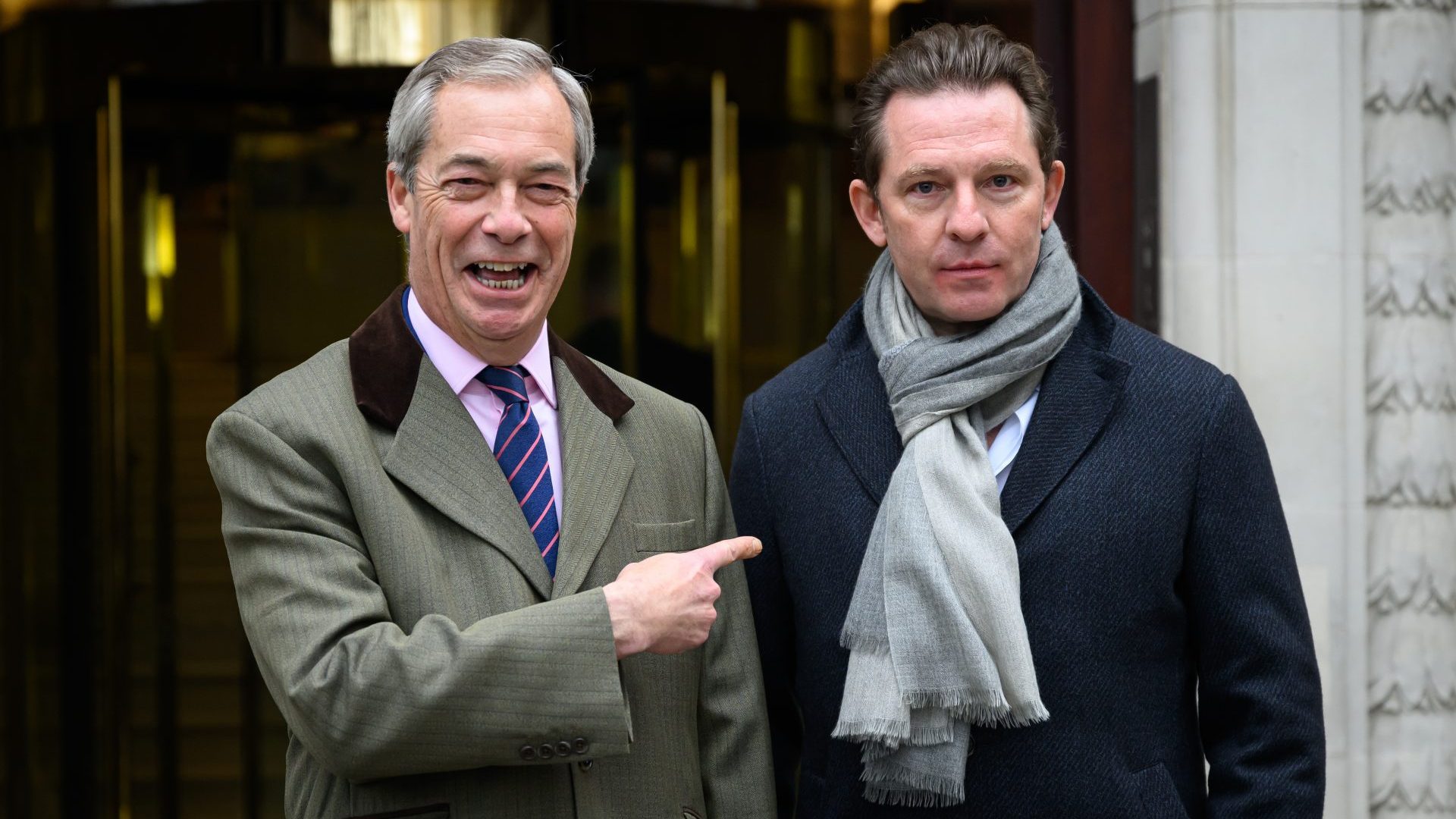 Nigel Farage poses with billionaire Nick Candy as he is announced as Reform's party treasurer (Photo by Leon Neal/Getty Images)