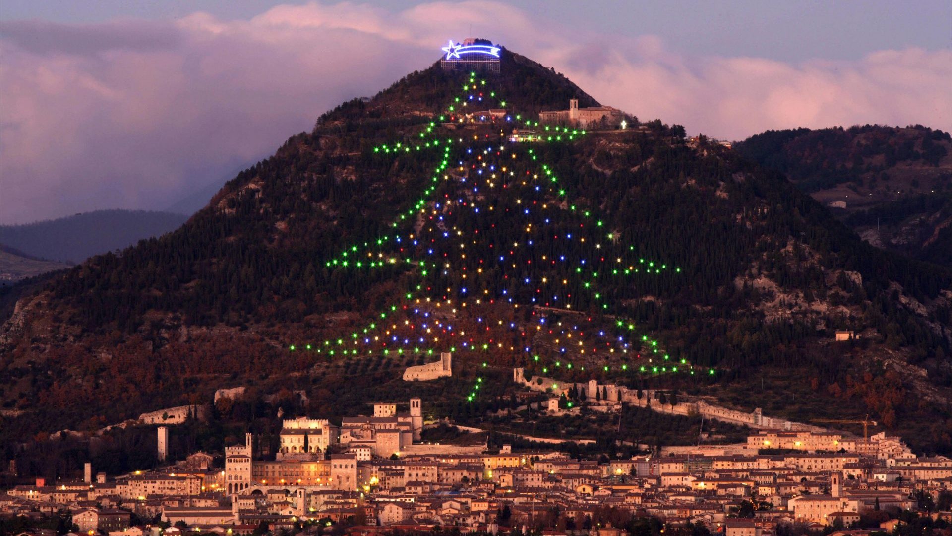 A Christmass tree decorates Mount Ingino, overlooking the Umbrian city of Gubbio. Photo: Paolo TOSTI/AFP via Getty Images