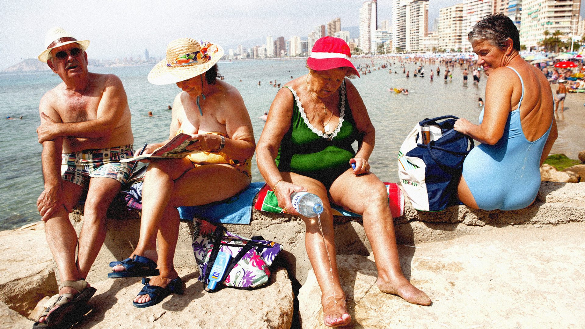 A group of pensioners relax on Playa de Levante beach in Benidorm. Photo: Thomas Vilhelm/Cover/Getty