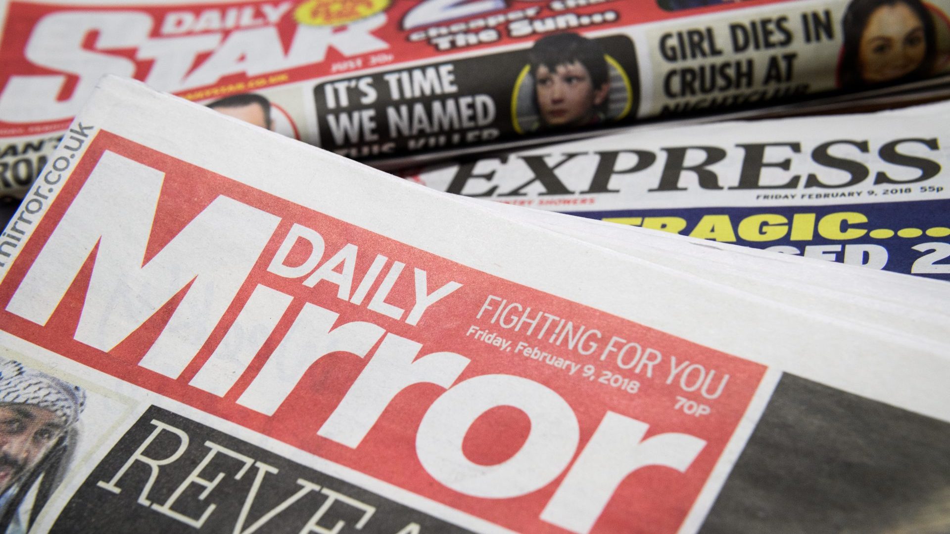 Issues of the Daily Mirror, Daily Star and Daily Express. Photo: Leon Neal/Getty Images