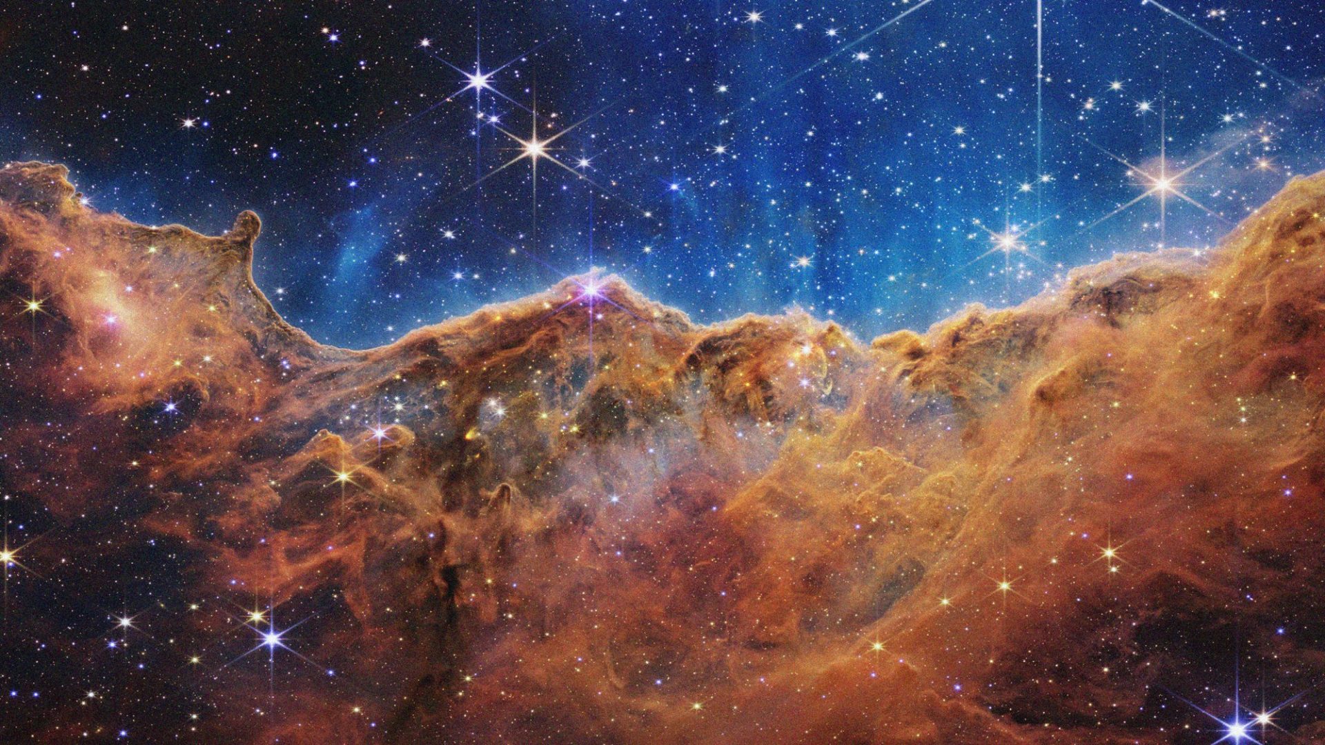 The edge of a young, star-forming region called NGC 3324 in the Carina Nebula, captured in infrared light by Nasa’s James Webb Space Telescope. Image: Nasa/Getty