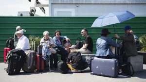 People wait outside Barcelona Sant railway station during the massive power cut that affected the entire Iberian peninsula and the south of France on April 28. Photo: Josep Lago/AFP/Getty