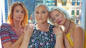 Virginia Giuffre (centre) with fellow Jeffrey Epstein victims Sarah Ransome and Marijke Chartouni in 2019. Photo: Emily Michot/Miami Herald/Tribune News Service/Getty