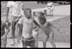 Children play
in water from
a hydrant in
Newark, New
Jersey, during
the United
States’ 1988
heatwave.